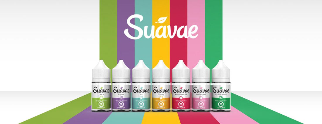 Seven Suavae e-liquid bottles are lined up, each with a colored fruit flavor label: apple, grape, ice, mango, pomegranate, raspberry, and watermelon. The background features matching vertical color stripes and the Suavae logo in white above.