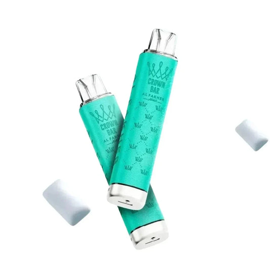 Green cylindrical vape device labeled "Al Fakher" next to its black and green packaging. Text highlights "Crown Bar," "MINI 3K," and "Big Cloud." Sleek and modern design.