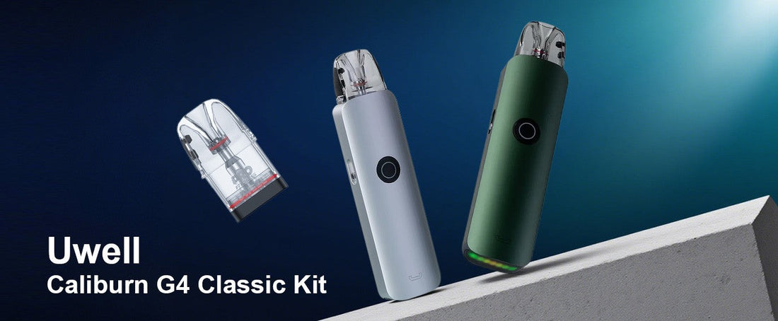 Two sleek vape devices, one silver and one green, stand on a tilted gray surface against a gradient blue background. A clear atomizer is suspended mid-air. Text reads 'Uwell Caliburn G4 Classic Kit.'